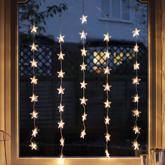 Lichtervorhang Sterne warmweiß