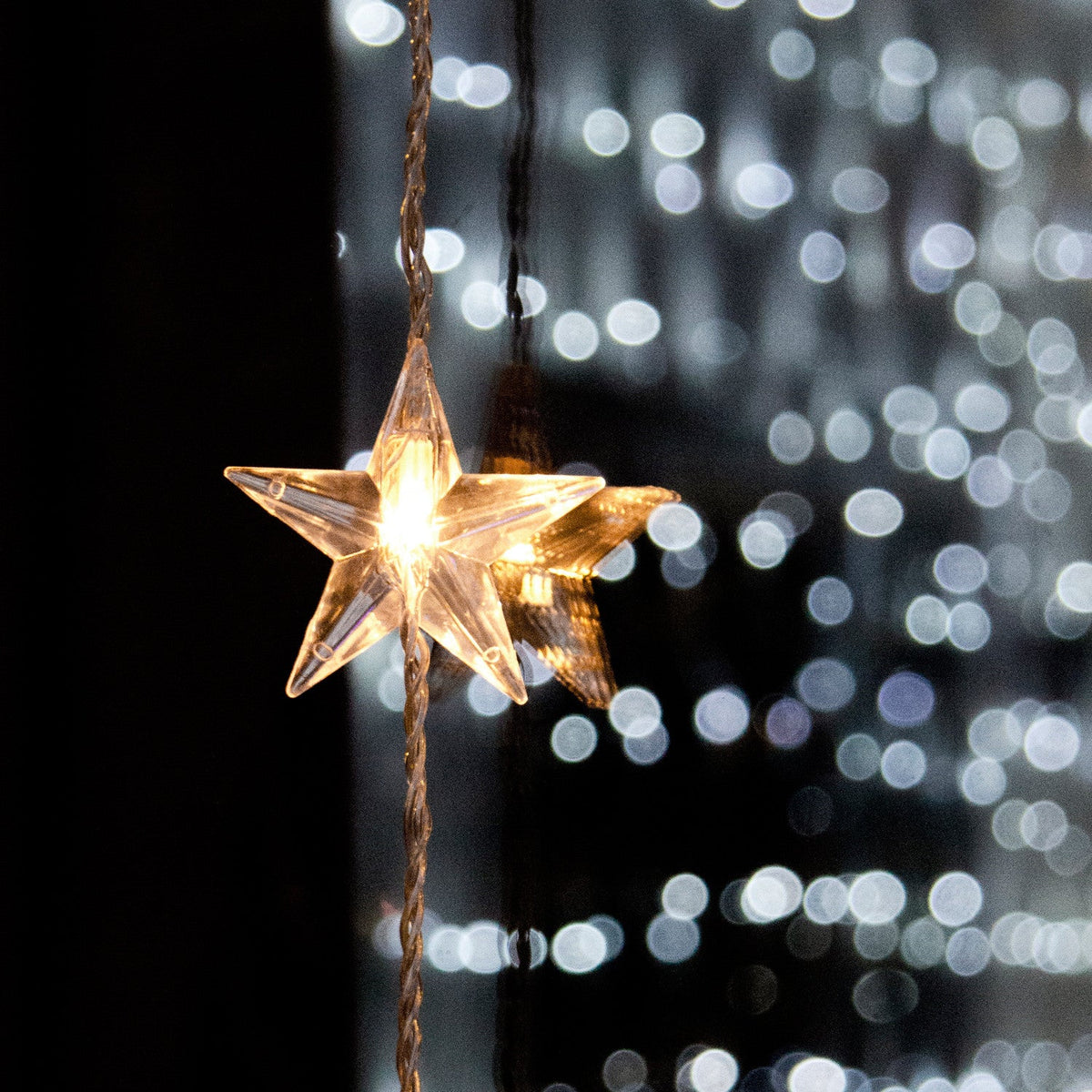 Lichtervorhang Sterne warmweiß